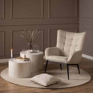 Fauteuil en tissu beige capitonné piétmeent oblique en métal noir - OTIS